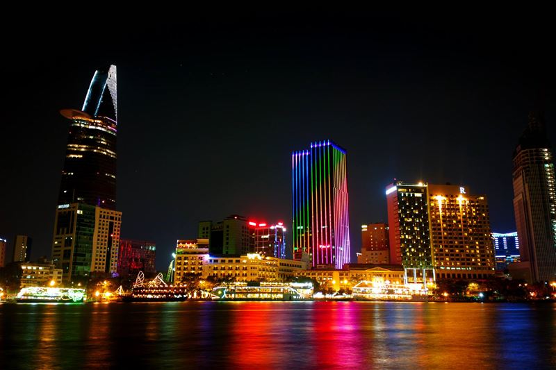 Saigon Nightlife Dinner Cruise: Vietnamese Cuisine and Folk Entertainment on a Traditional Boat